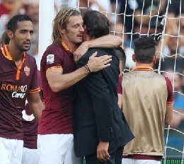 Immagine_abbraccio_derby_garcia_balzaretti