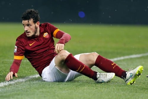 AS Roma's Alessandro Florenzi reacts as he sits on the field during their Italian Serie A soccer match against Empoli in Rome