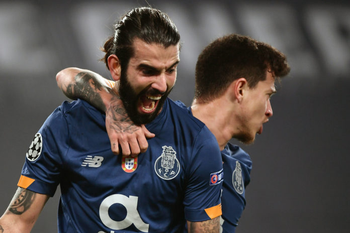 Sergio Oliveira of FC Porto celebrates after scoring on penalty the goal of 0-1 during the Champions League round of 16